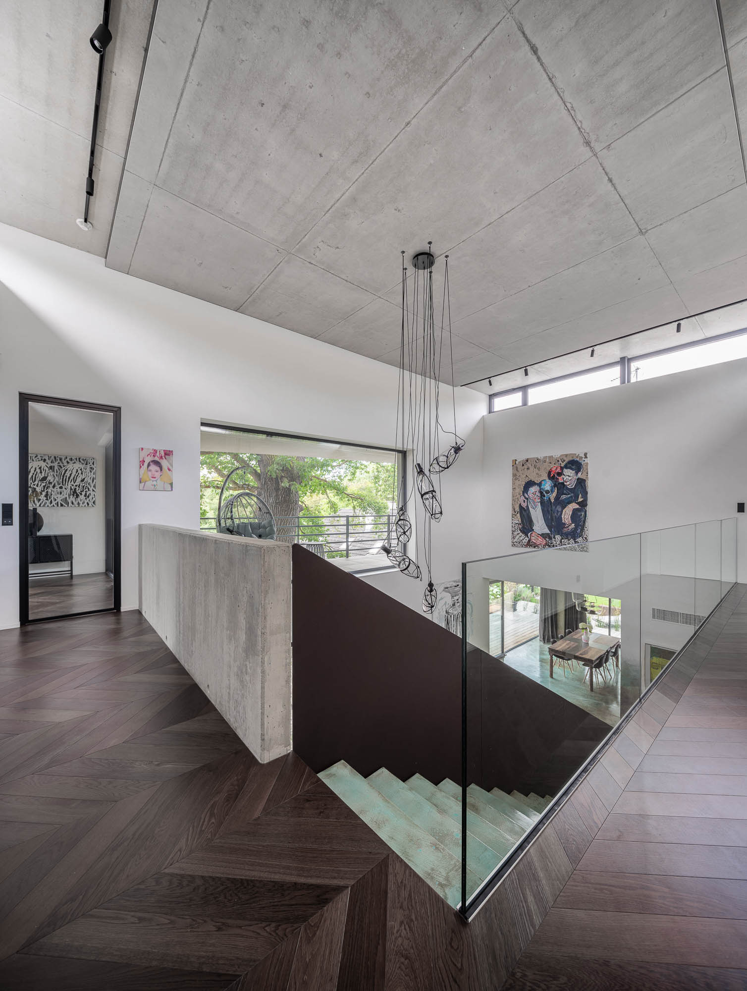 Villa Lučiny — exposed concrete ceiling with acoustic panel OOOOX interior design
