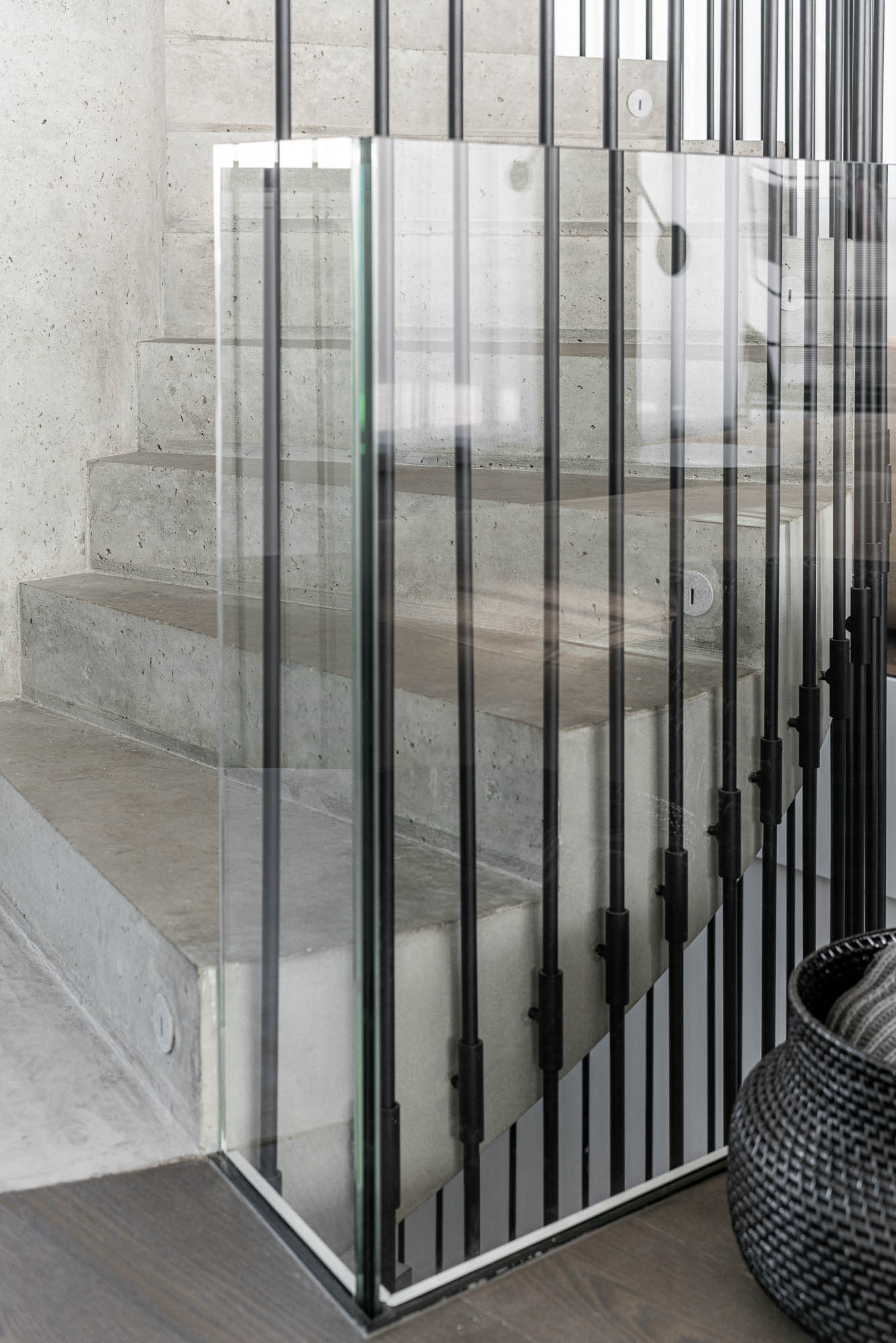 Villa Ohnivcova — concrete staircase detail with glass partition OOOOX Prague