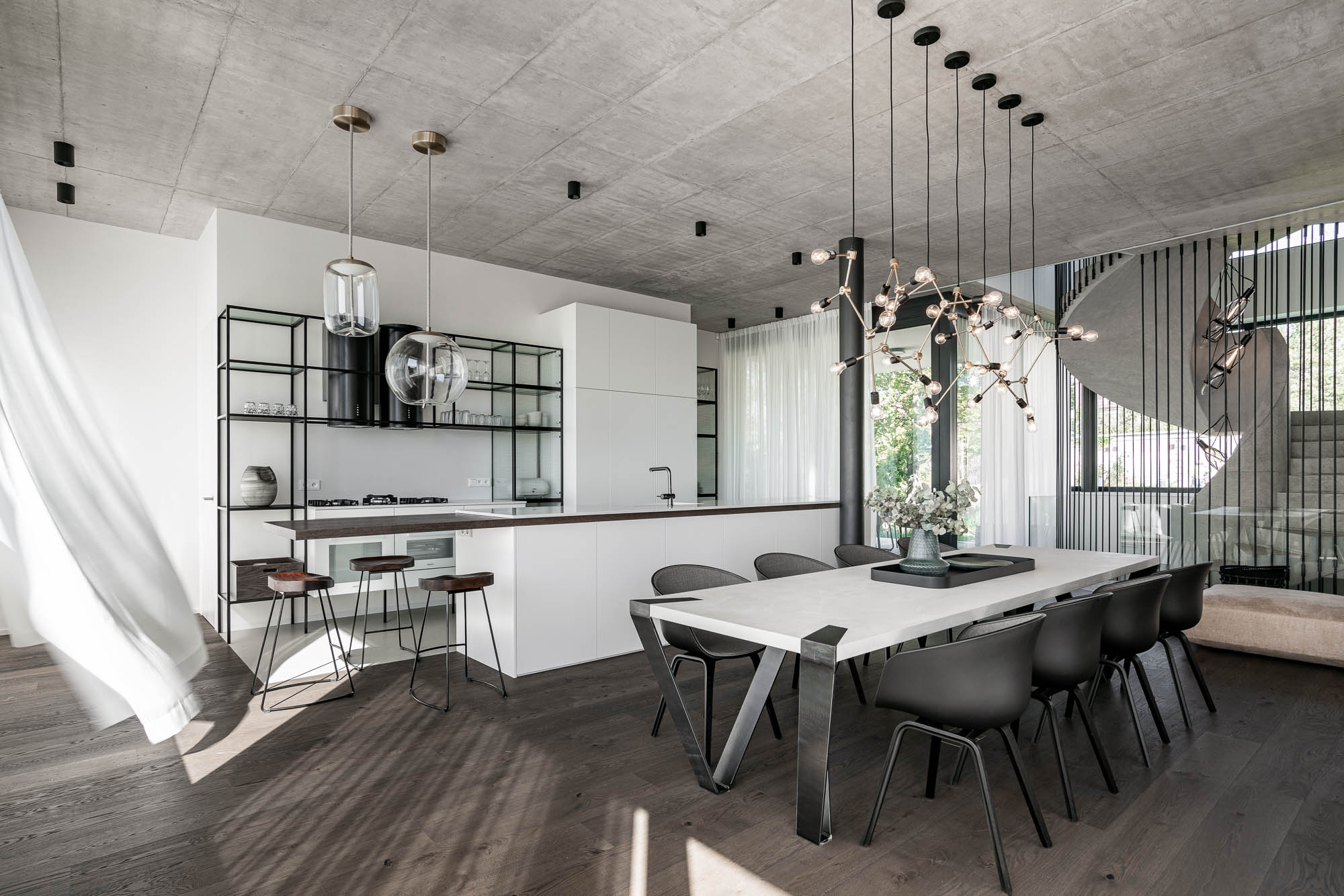 Villa Ohnivcova interior — exposed concrete ceiling and lighting design OOOOX Prague