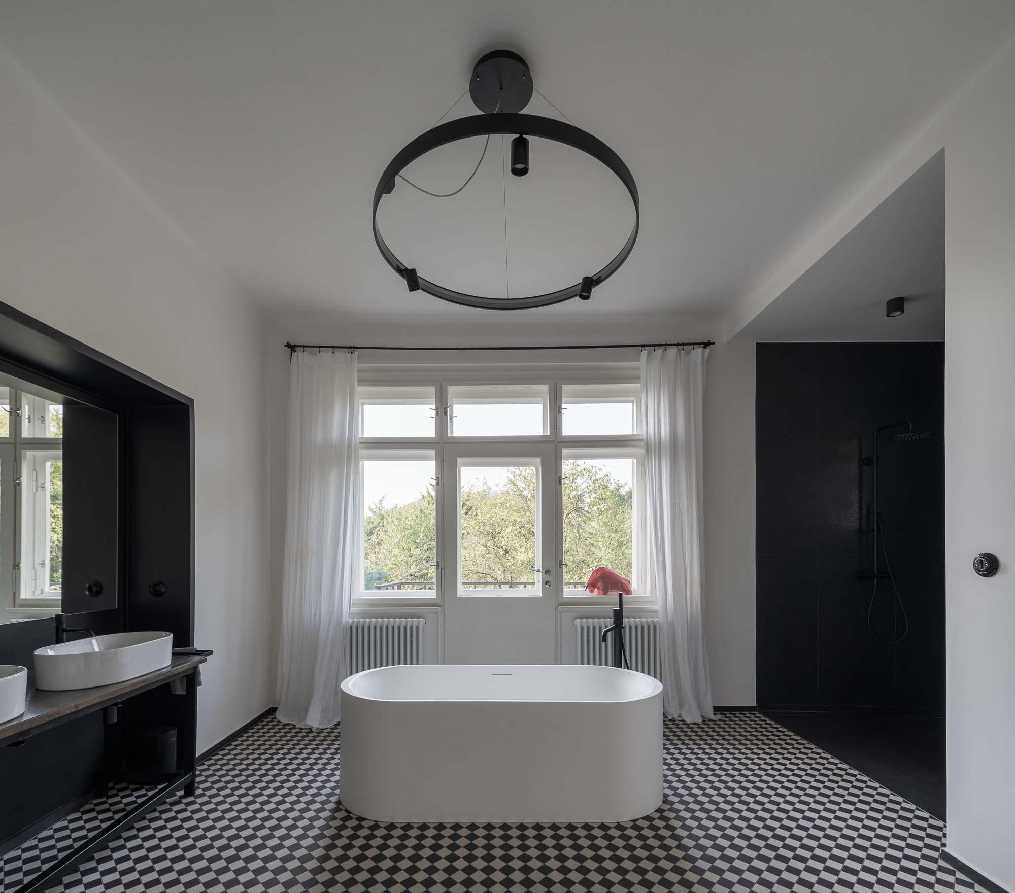 Retro villa bathroom Beroun freestanding bathtub centre black-and-white diamond mosaic floor black fittings large window OOOOX