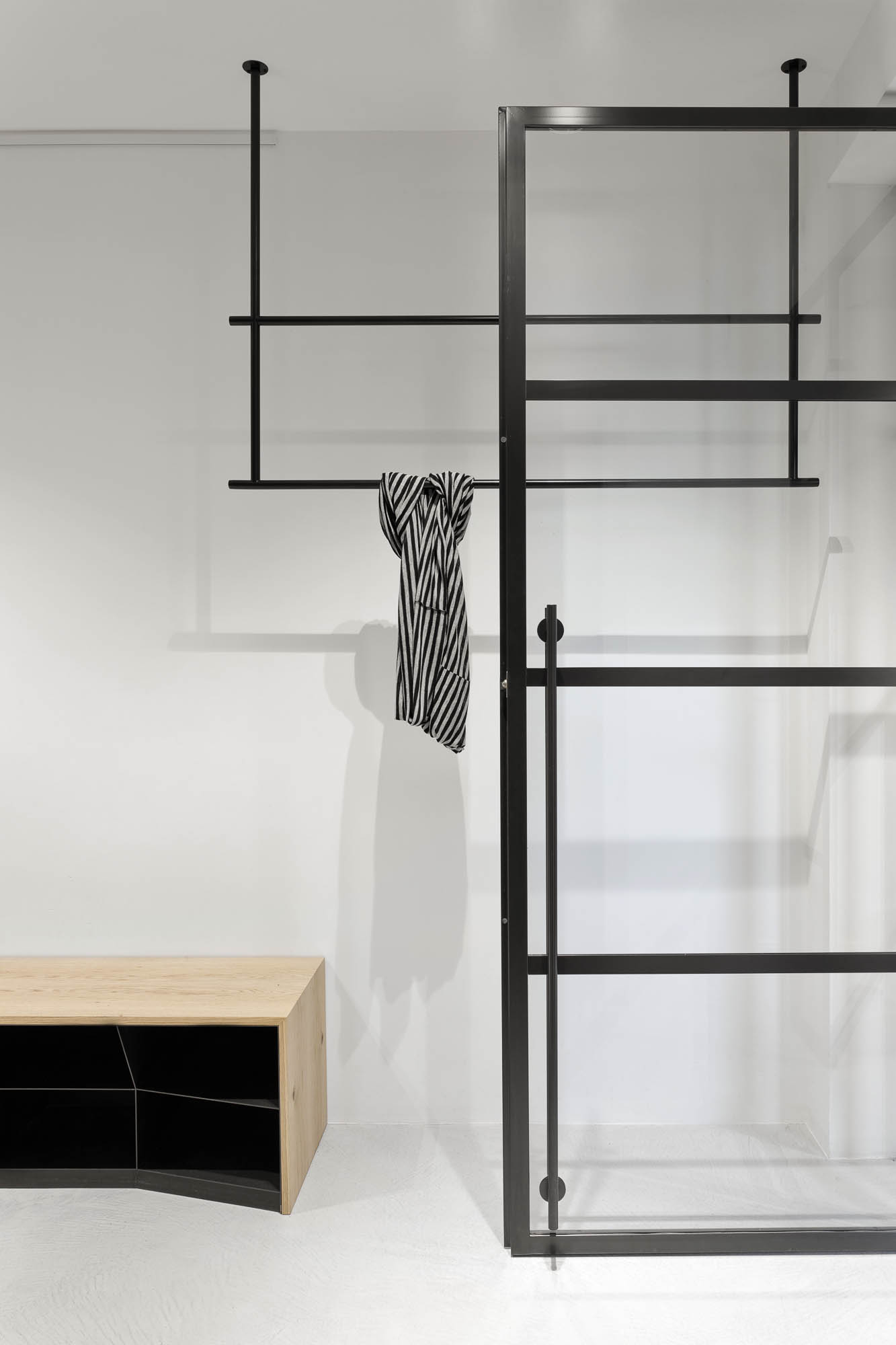 Walk-in wardrobe black steel glass crittall partition suspended clothes rail oak storage bench minimal OOOOX