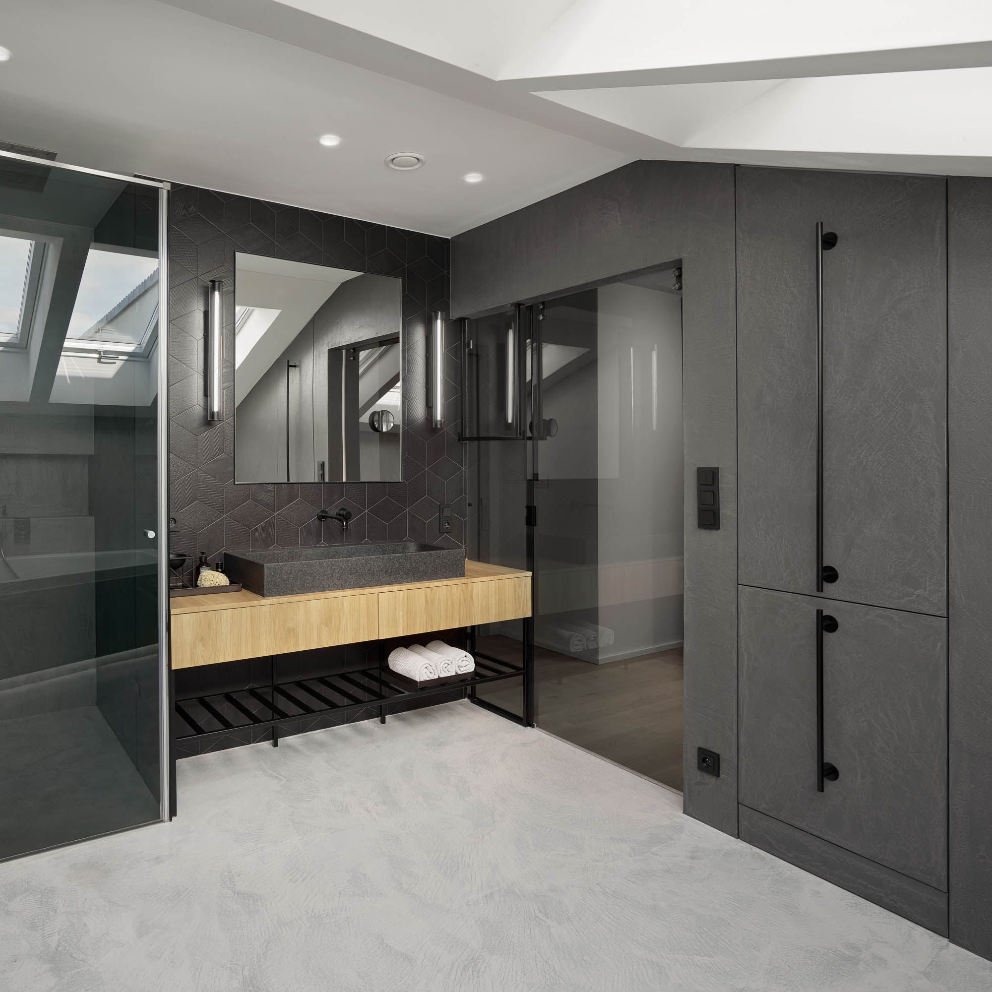 Master bathroom panoramic dark geometric tile walk-in shower oak vanity grey stained storage panel OOOOX