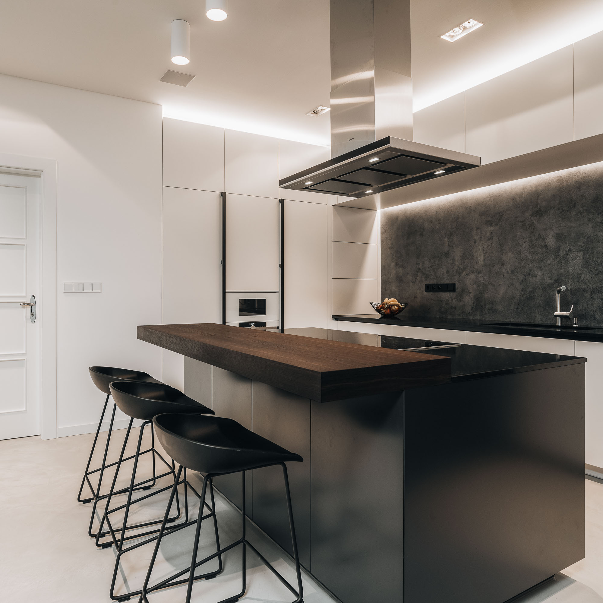 separate kitchen with island in renovated Letná apartment | OOOOX