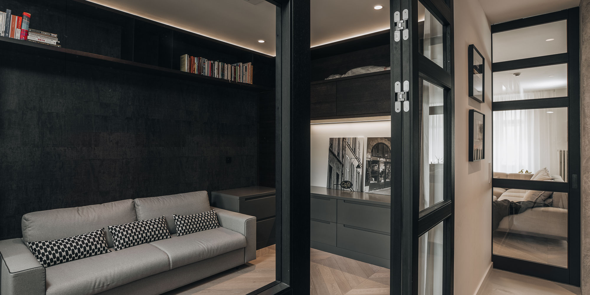 dark home office separated by a timber-framed glazed partition | OOOOX