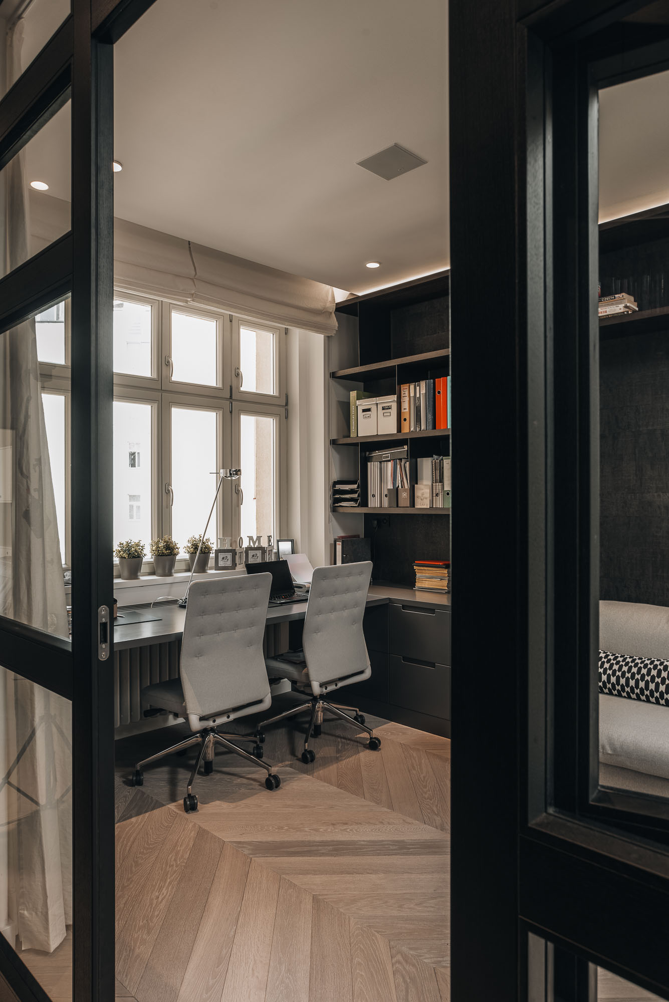 Prague apartment renovation – living area with timber-framed glazed partitions | OOOOX
