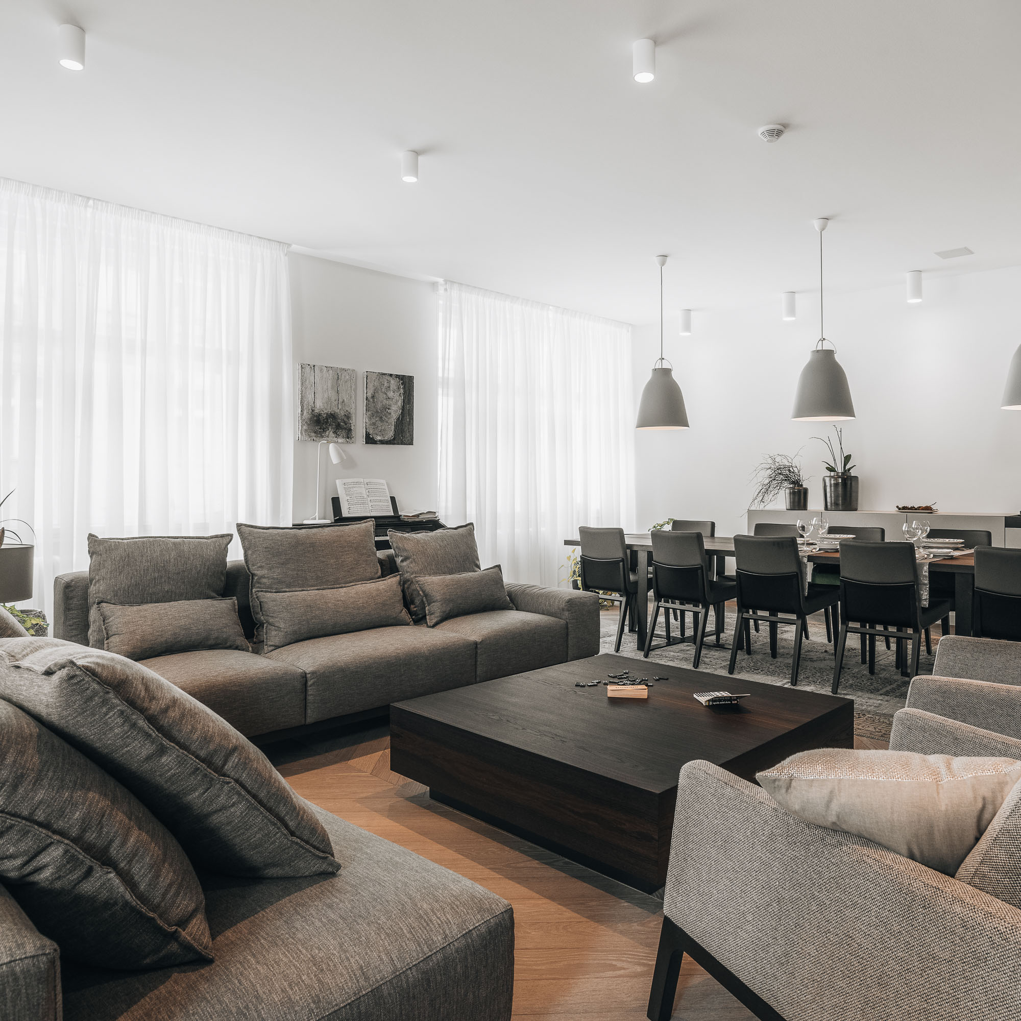 Prague apartment renovation – living area with timber-framed glazed partitions | OOOOX