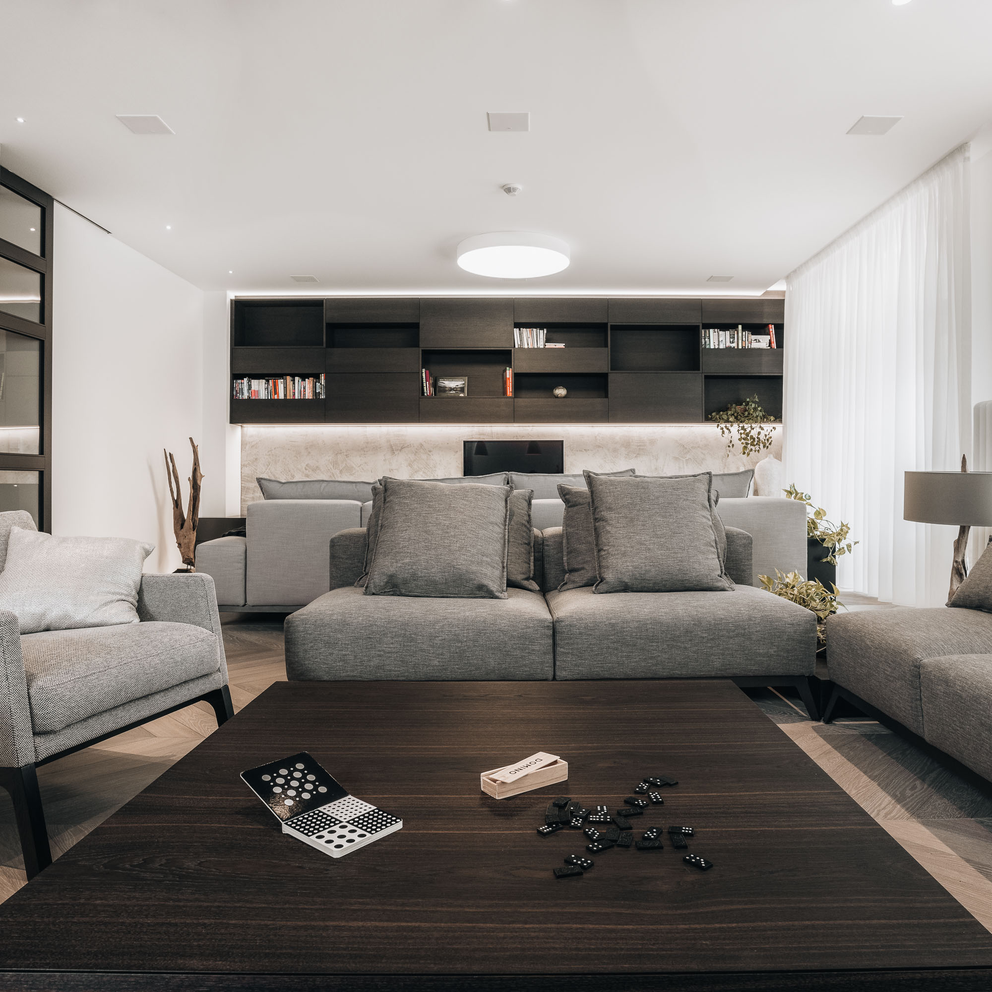 Prague apartment renovation – living area with timber-framed glazed partitions | OOOOX