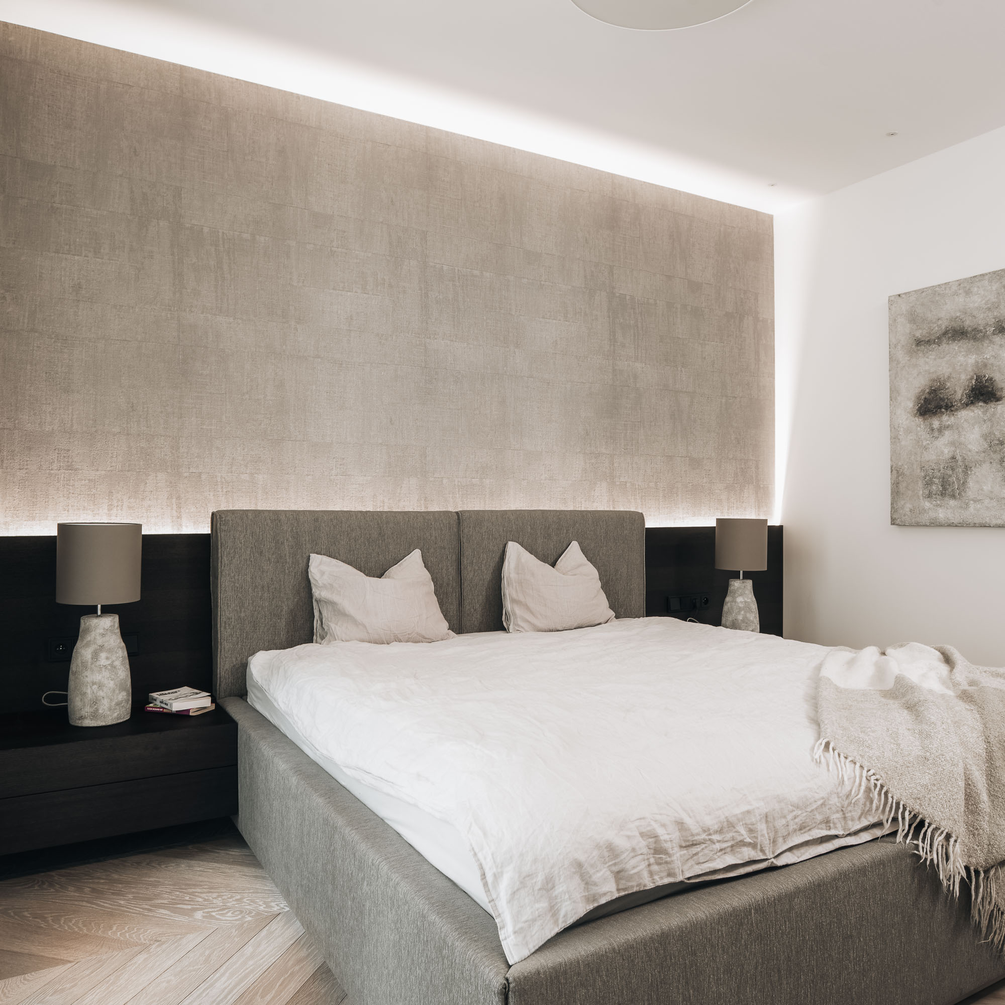 bedroom in renovated Letná apartment with wallpaper and indirect lighting | OOOOX
