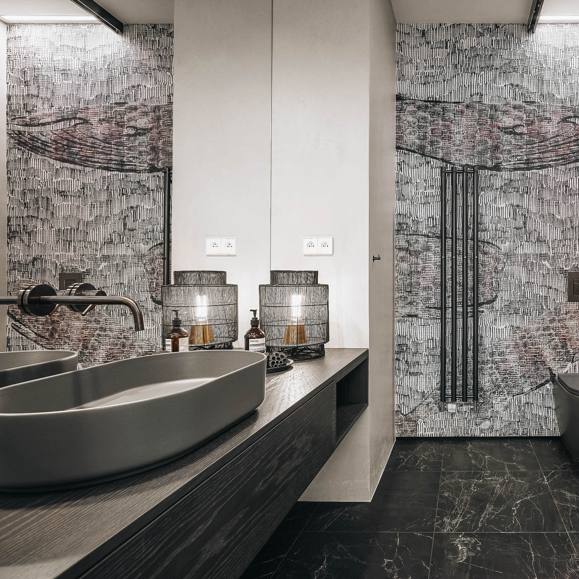 Bathroom with waterproof wallpaper even inside the shower and a stone sink | design by OOOOX