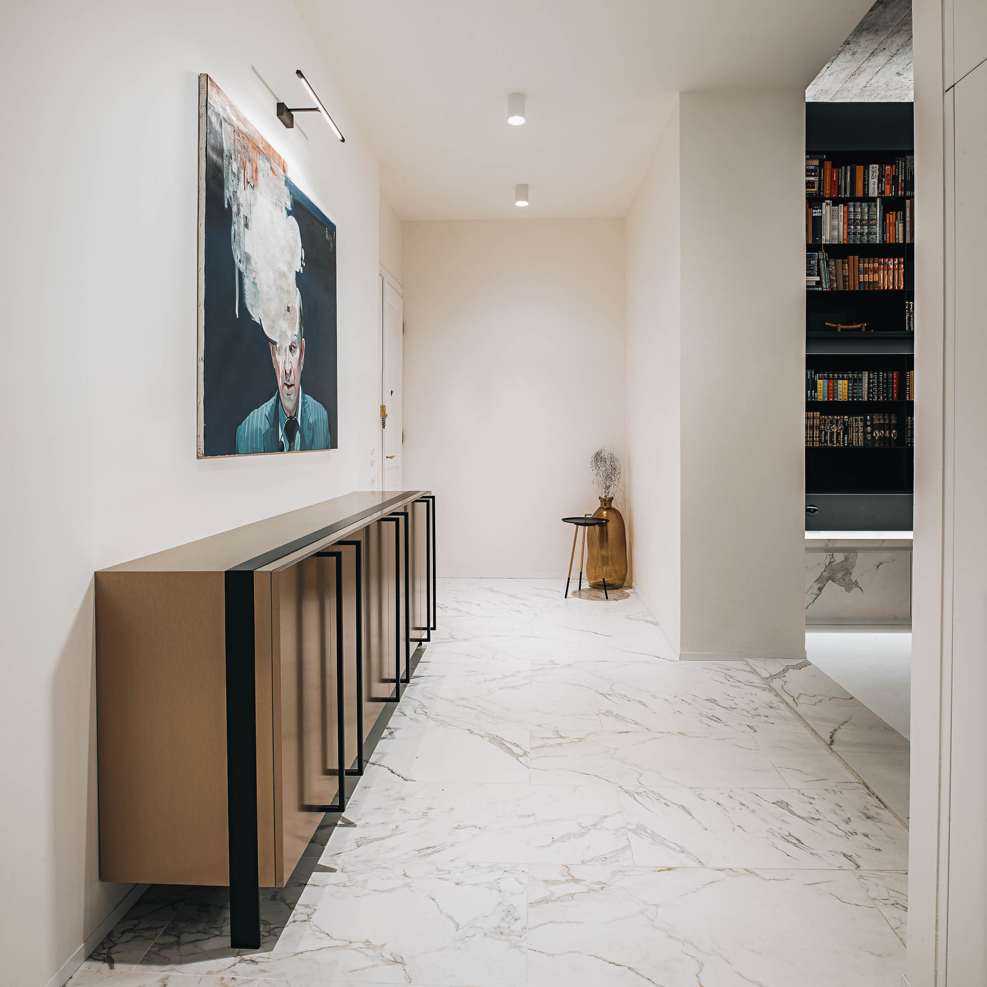 Corridor to living room white marble floor gold sideboard figurative painting view into bookshelf concrete OOOOX